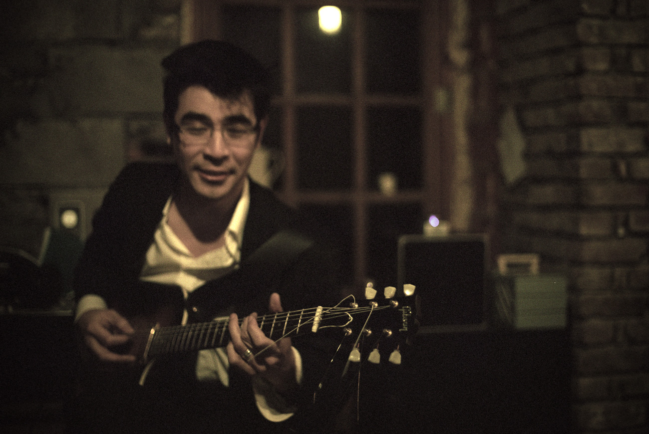 Sidharta Gautama playing the guitar